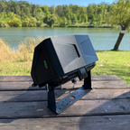 Protective visor helping shield a Lowrance fish finder from water spray and impacts